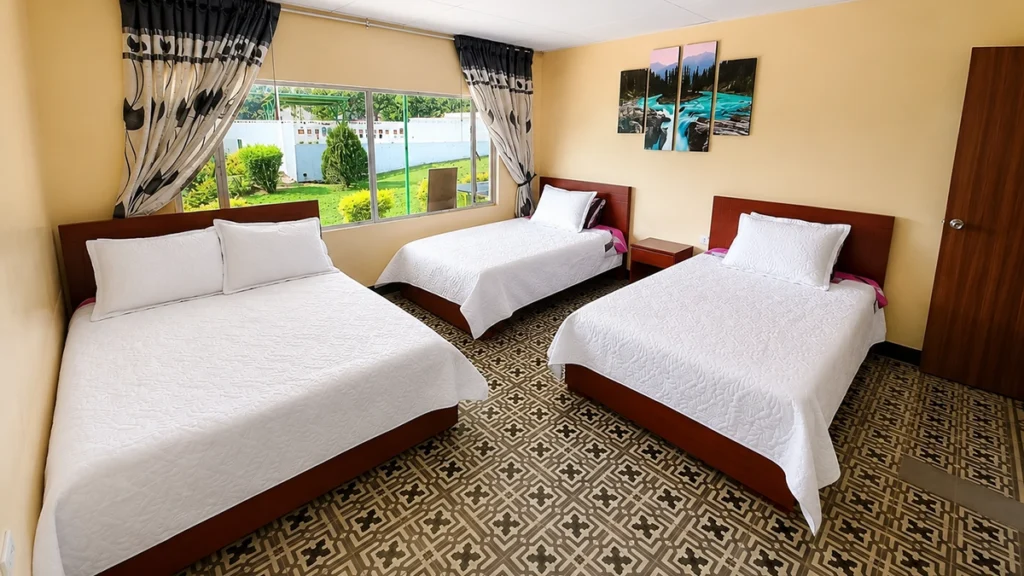 Habitación familiar con tres camas en Finca La María Centro Vacacional